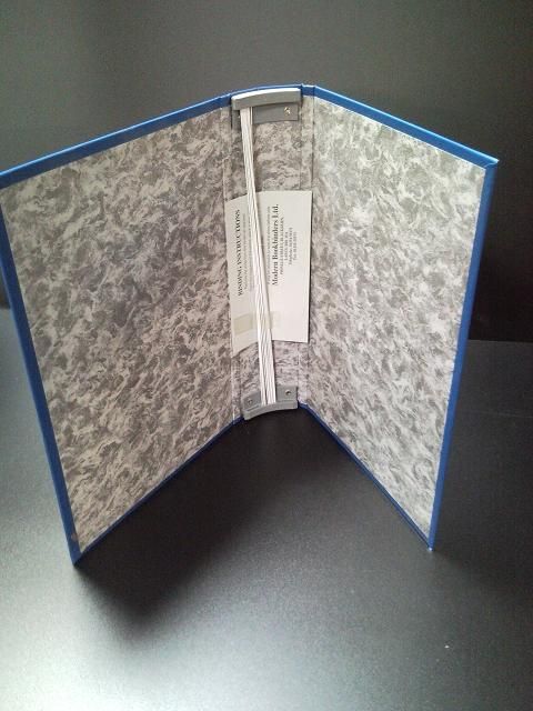Ring binder interior showing the metal ring mechanism